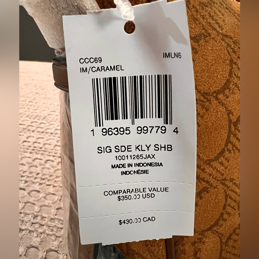 Coach Kailey Shoulder Bag
In Signature Suede - Picture 8 of 14